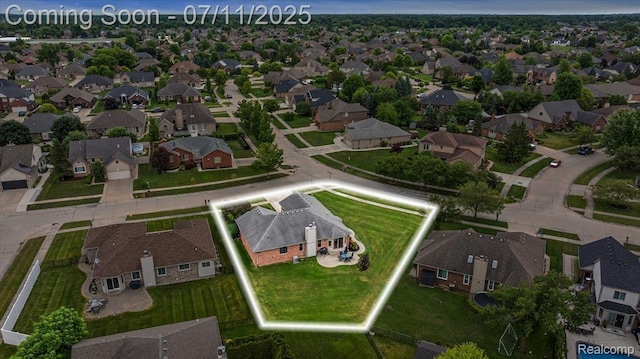 54561 Laurel Dr, Macomb, MI 48042 - aerial view of property and surrounding area with property boundaries highlighted and nearby suburban area