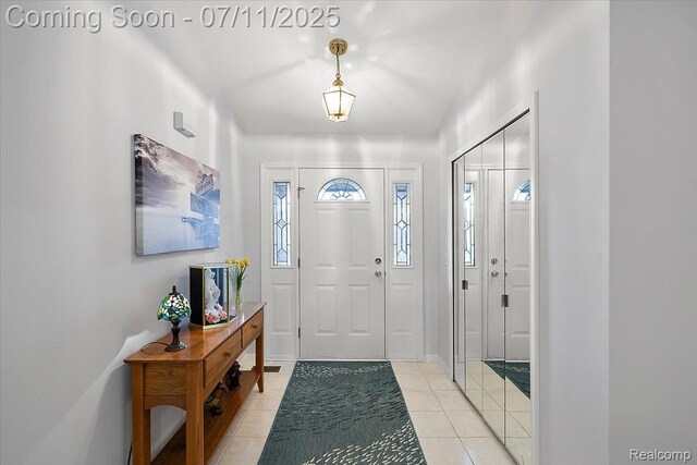 54561 Laurel Dr, Macomb, MI 48042 - foyer entrance with light tile patterned floors