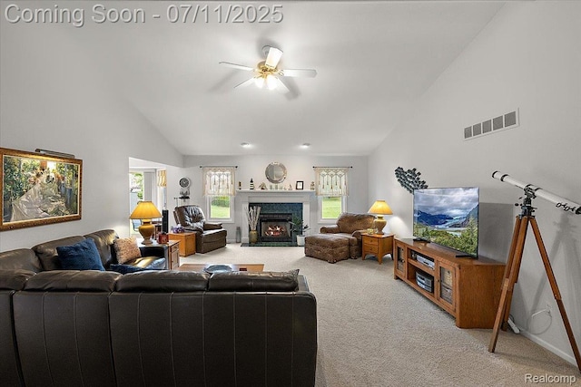54561 Laurel Dr, Macomb, MI 48042 - carpeted living room featuring vaulted ceiling, ceiling fan, and a premium fireplace