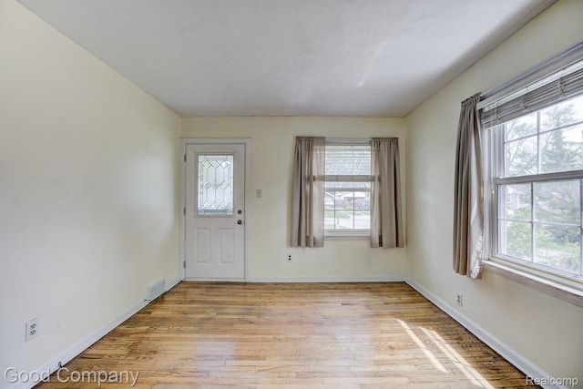 1977 Princeton Rd, Troy, MI 48072 - foyer with healthy amount of natural light and light wood-style flooring