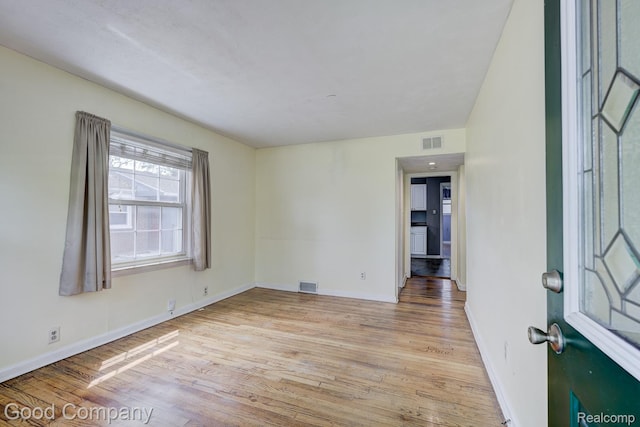 1977 Princeton Rd, Troy, MI 48072 - spare room with light wood-type flooring and baseboards
