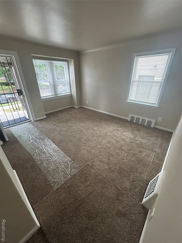 3381 S Ethel St, Detroit, MI 48217 - spare room with carpet flooring
