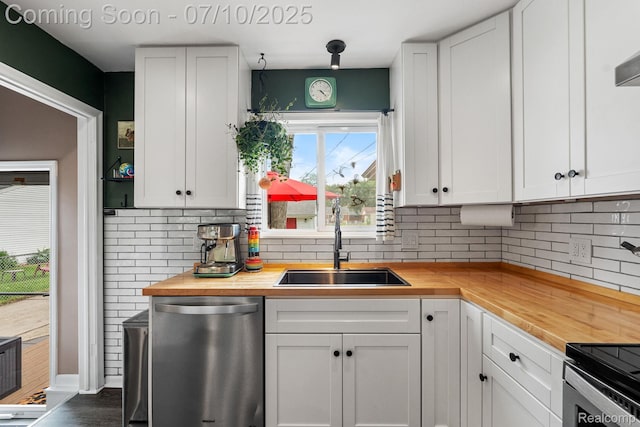 23316 Brookdale Blvd, Saint Clair Shores, MI 48082 - kitchen with dishwasher, butcher block countertops, tasteful backsplash, and white cabinets