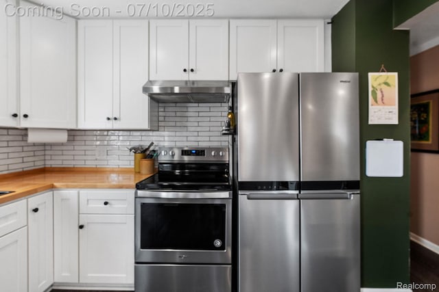 23316 Brookdale Blvd, Saint Clair Shores, MI 48082 - kitchen with appliances with stainless steel finishes, ventilation hood, wood counters, white cabinets, and backsplash