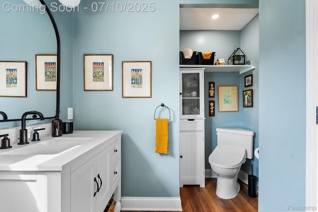 23316 Brookdale Blvd, Saint Clair Shores, MI 48082 - bathroom featuring wood finished floors and vanity