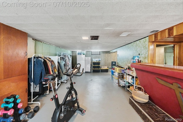 23316 Brookdale Blvd, Saint Clair Shores, MI 48082 - workout area featuring wooden walls and a paneled ceiling