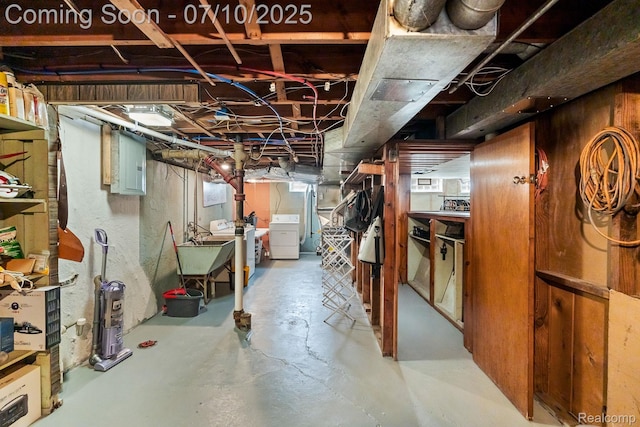 23316 Brookdale Blvd, Saint Clair Shores, MI 48082 - unfinished below grade area featuring electric panel and washer and dryer