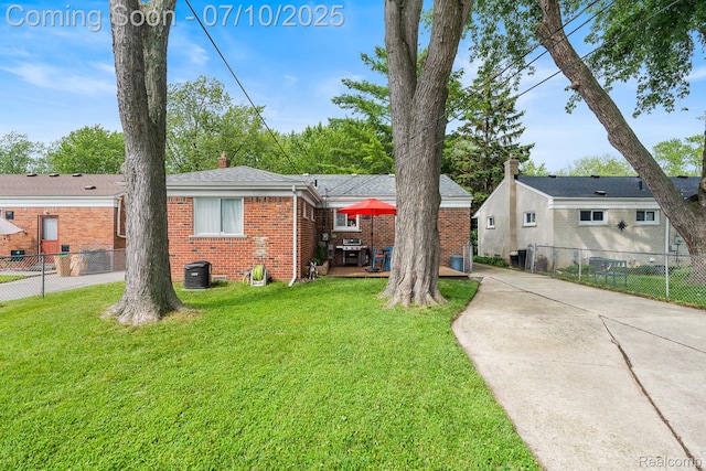 23316 Brookdale Blvd, Saint Clair Shores, MI 48082 - view of front facade with brick siding, roof with shingles, and a patio