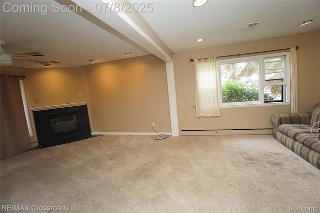 6785 Belleville Rd, Van Buren, MI 48111 - carpeted living room with a glass covered fireplace, ceiling fan, a baseboard radiator, and recessed lighting