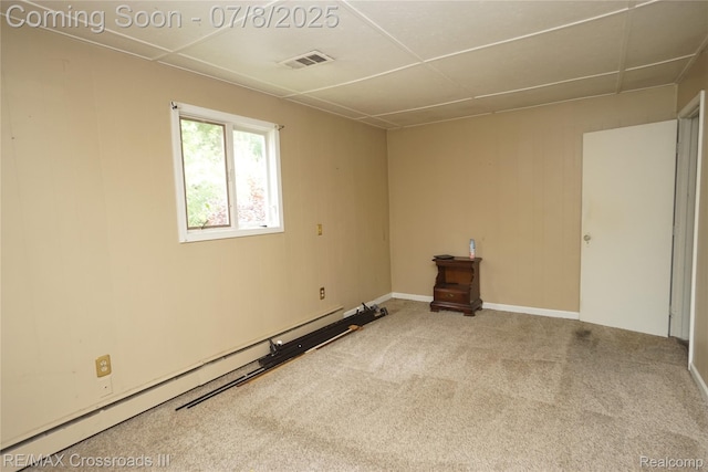 6785 Belleville Rd, Van Buren, MI 48111 - unfurnished room featuring a baseboard radiator and carpet floors