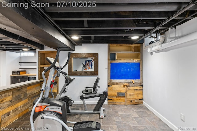 4247 Morningview Dr, Shelby Twp, MI 48316 - exercise room with baseboards and stone finish flooring
