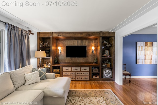 4247 Morningview Dr, Shelby Twp, MI 48316 - living room featuring wood finished floors and built in features