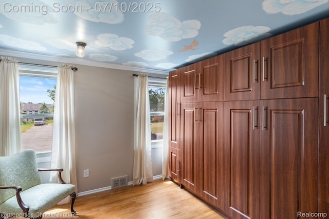 4247 Morningview Dr, Shelby Twp, MI 48316 - living area with light wood-style floors and ornamental molding