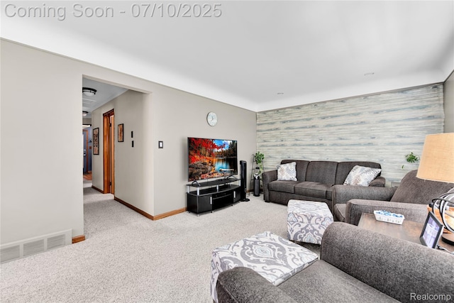 144 1st St, Wyandotte, MI 48192 - living room with an accent wall, wallpapered walls, and carpet floors