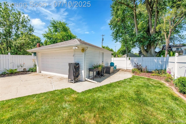 144 1st St, Wyandotte, MI 48192 - fenced backyard with a garage and an outdoor structure