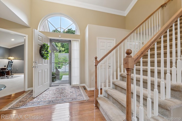 30166 Brightwood Dr Unit 40, Novi, MI 48377 - foyer entrance featuring crown molding, hardwood / wood-style flooring, and stairs