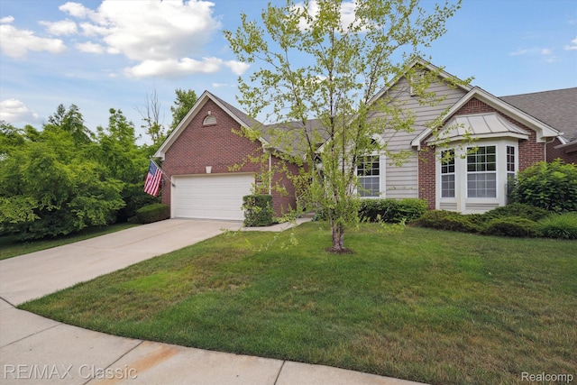 30166 Brightwood Dr Unit 40, Novi, MI 48377 - view of front facade with brick siding, a garage, driveway, and a front lawn