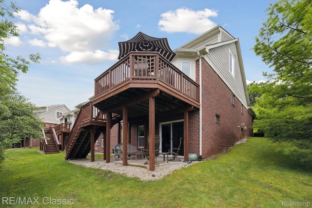 30166 Brightwood Dr Unit 40, Novi, MI 48377 - rear view of house featuring a deck, brick siding, a yard, stairway, and a patio area