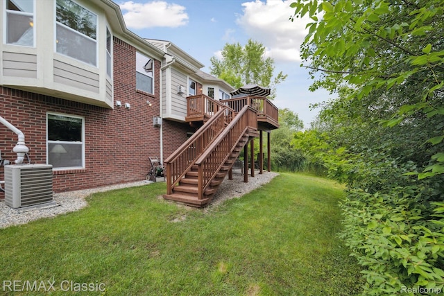 30166 Brightwood Dr Unit 40, Novi, MI 48377 - view of green lawn with a wooden deck and stairway