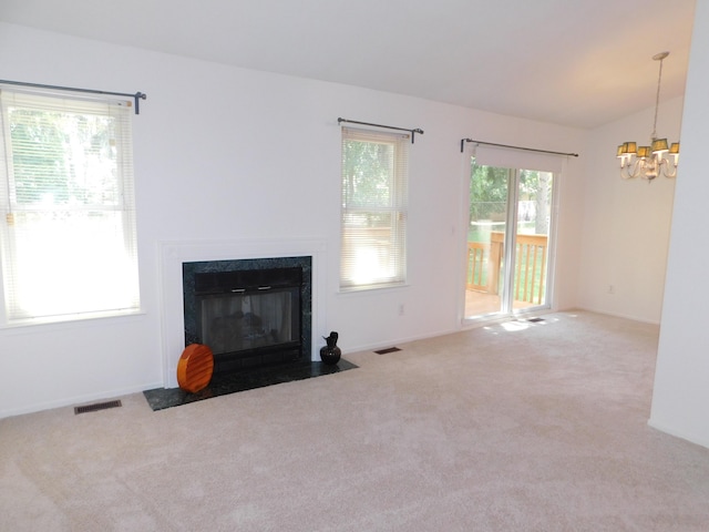 36561 S Deerhurst S, Westland, MI 48185 - unfurnished living room with a chandelier, carpet flooring, and a fireplace