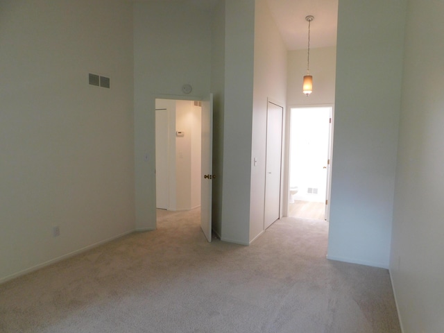 36561 S Deerhurst S, Westland, MI 48185 - hallway with a towering ceiling and carpet floors