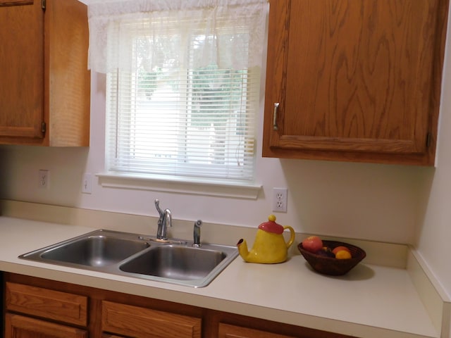 36561 S Deerhurst S, Westland, MI 48185 - kitchen with brown cabinets and light countertops