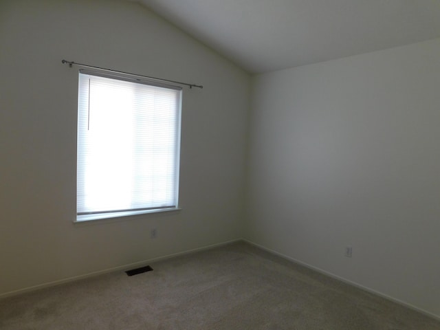 36561 S Deerhurst S, Westland, MI 48185 - unfurnished room with healthy amount of natural light, carpet, and lofted ceiling