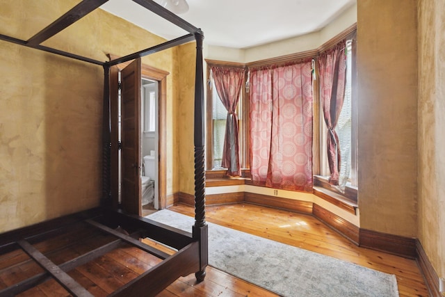 501 E Michigan Ave, Marshall, MI 49068 - bathroom with wood-type flooring and toilet