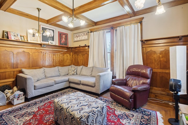501 E Michigan Ave, Marshall, MI 49068 - living room featuring beam ceiling, coffered ceiling, wainscoting, wood finished floors, and wood walls