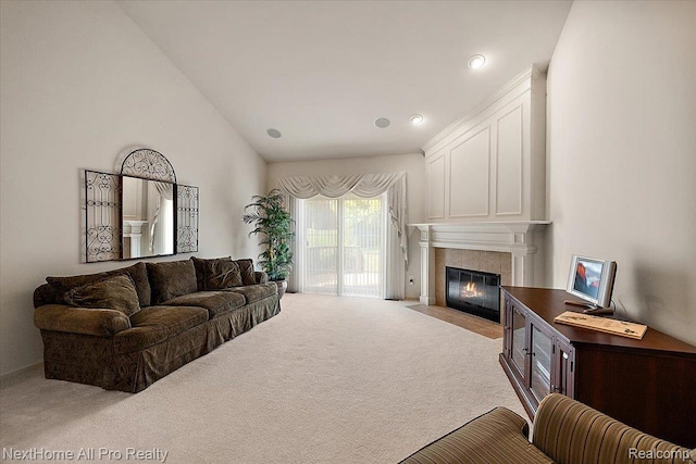 838 Knolls Landing Dr Unit 6, Milford, MI 48381 - living area featuring carpet, a fireplace, vaulted ceiling, and recessed lighting