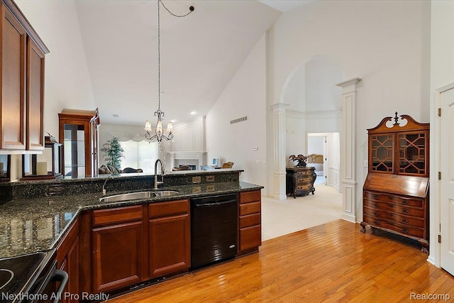 838 Knolls Landing Dr Unit 6, Milford, MI 48381 - kitchen featuring dishwasher, ornate columns, range with electric stovetop, dark stone countertops, and light wood-style flooring