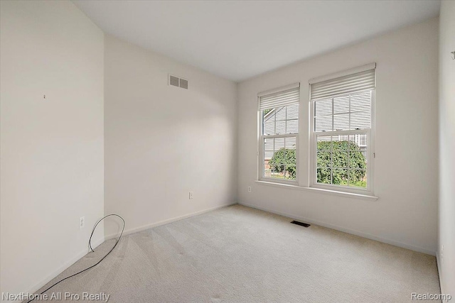 838 Knolls Landing Dr Unit 6, Milford, MI 48381 - carpeted spare room with baseboards