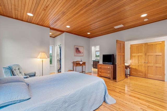 14091 Scio Church Rd, Chelsea, MI 48118 - bedroom with wooden ceiling, light wood-type flooring, a walk in closet, and recessed lighting