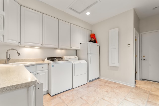 14091 Scio Church Rd, Chelsea, MI 48118 - laundry area featuring independent washer and dryer, attic access, and recessed lighting