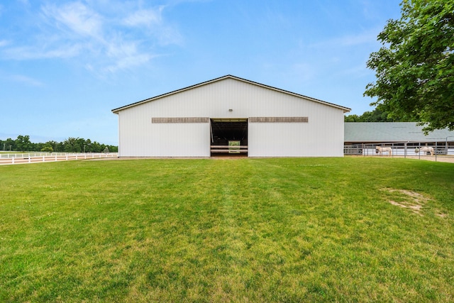 14091 Scio Church Rd, Chelsea, MI 48118 - view of property exterior with a pole building and an outbuilding