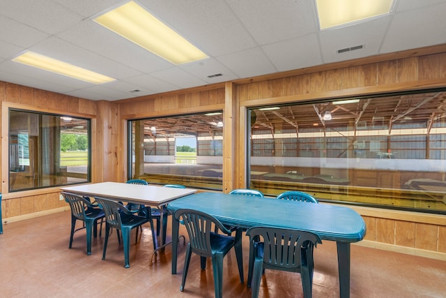 14091 Scio Church Rd, Chelsea, MI 48118 - dining area featuring wooden walls and plenty of natural light