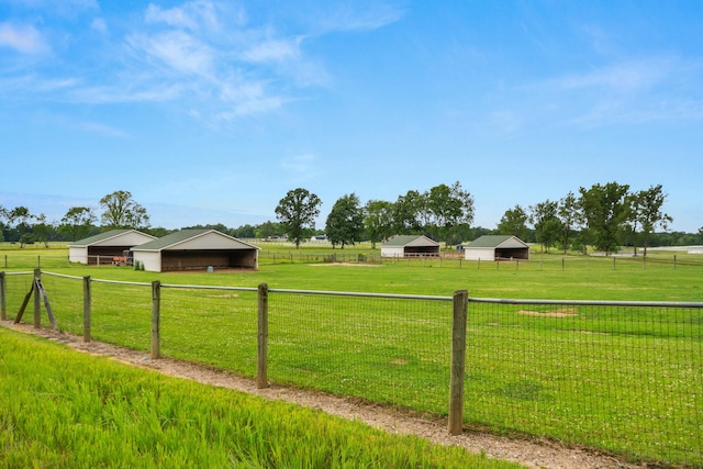 14091 Scio Church Rd, Chelsea, MI 48118 - view of yard featuring an outbuilding and a rural view