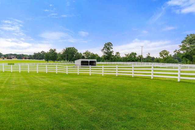 14091 Scio Church Rd, Chelsea, MI 48118 - view of yard featuring an outdoor structure and a view of countryside