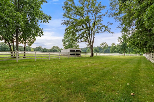 14091 Scio Church Rd, Chelsea, MI 48118 - view of green lawn featuring an exterior structure, an outbuilding, and a rural view
