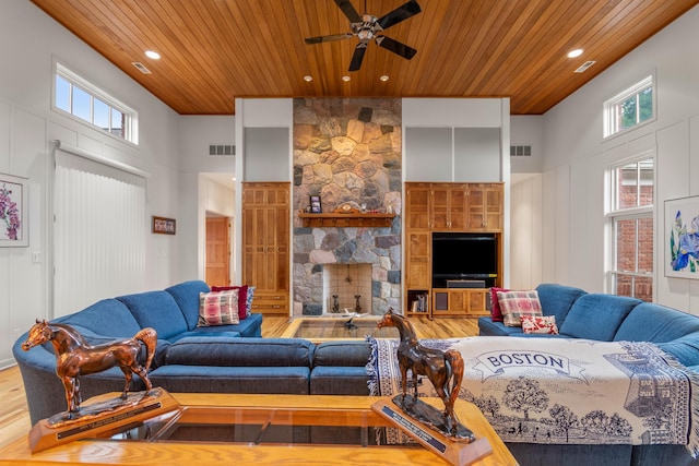 14091 Scio Church Rd, Chelsea, MI 48118 - living area with wooden ceiling, wood finished floors, a high ceiling, ceiling fan, and recessed lighting