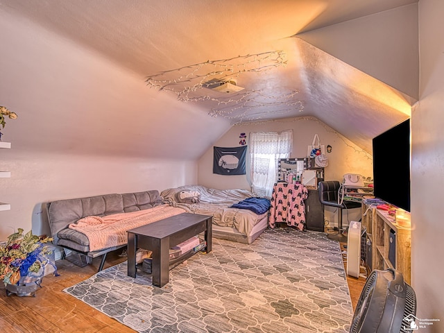 476 Borgess Ave, Monroe, MI 48162 - bedroom featuring vaulted ceiling and wood finished floors