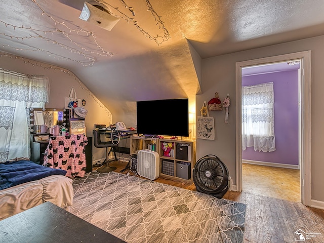 476 Borgess Ave, Monroe, MI 48162 - bedroom with vaulted ceiling and wood finished floors