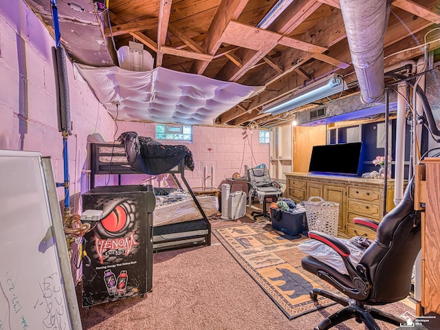 476 Borgess Ave, Monroe, MI 48162 - basement with freestanding refrigerator, carpet floors, and concrete block wall