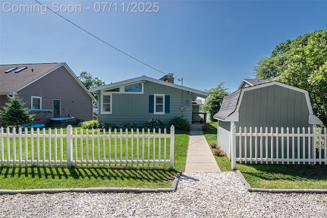 8856 Charbane Ave, White Lake, MI 48386 - view of front of house with a storage unit