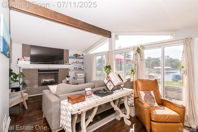 8856 Charbane Ave, White Lake, MI 48386 - living area featuring dark wood-type flooring, a fireplace, and a water view