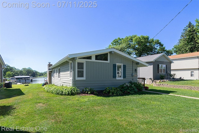 8856 Charbane Ave, White Lake, MI 48386 - view of front facade with a front yard
