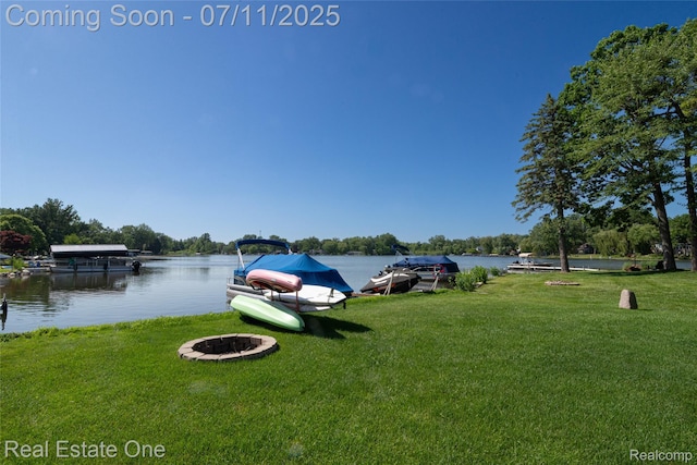 8856 Charbane Ave, White Lake, MI 48386 - dock area with a fire pit, a water view, and a yard