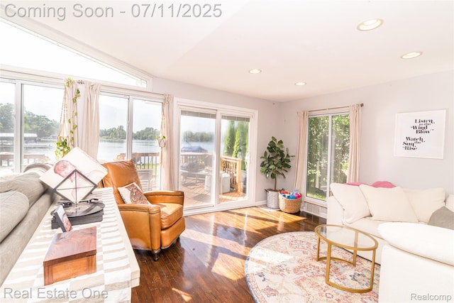 8856 Charbane Ave, White Lake, MI 48386 - living room featuring recessed lighting, hardwood / wood-style floors, and a water view