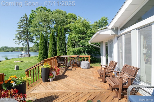 8856 Charbane Ave, White Lake, MI 48386 - deck with a water view and a yard