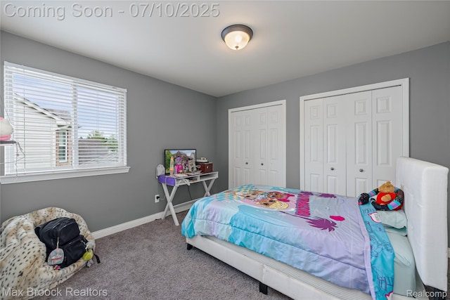 5142 Trailwood Ln, Warren, MI 48092 - bedroom featuring multiple closets and carpet floors